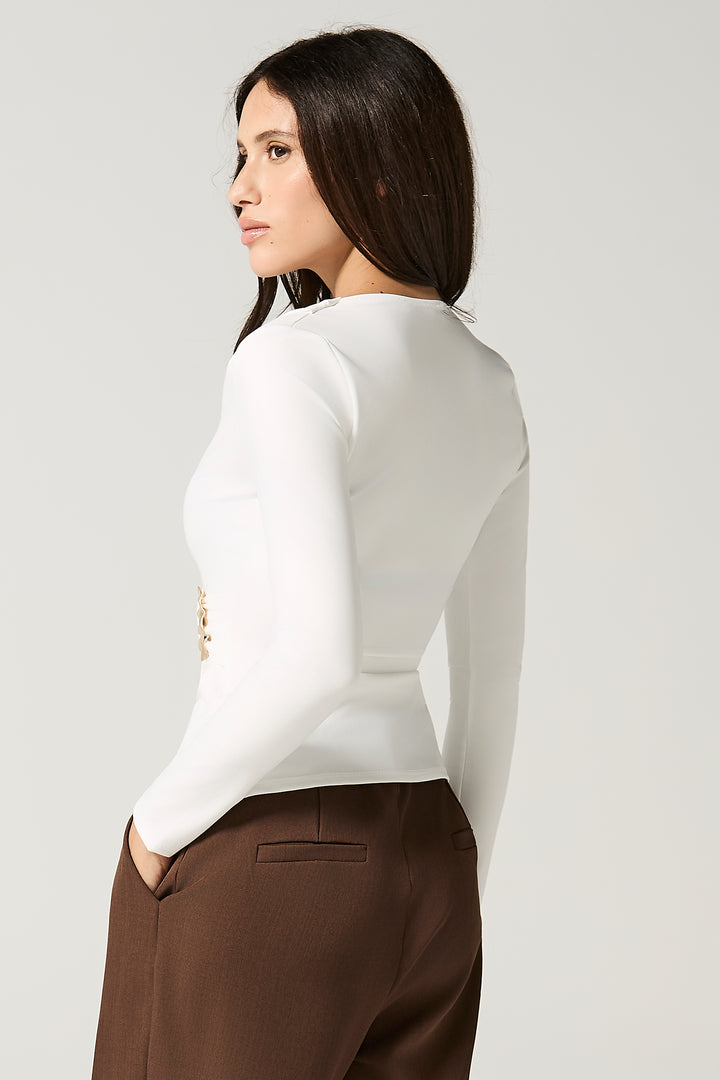 Maglia scollo a V incrociato con gioiello