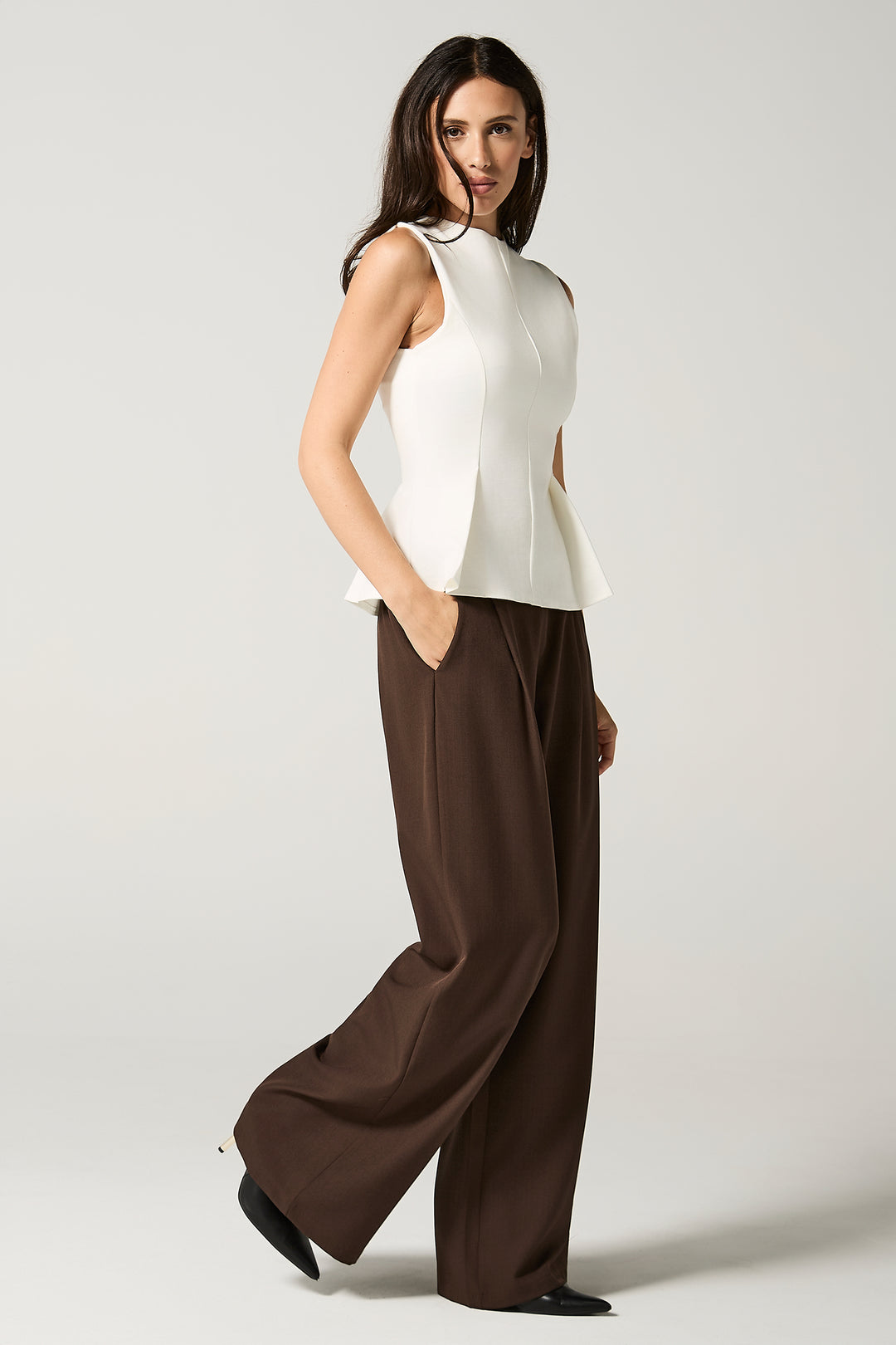 Top fondo svasato con pieghe