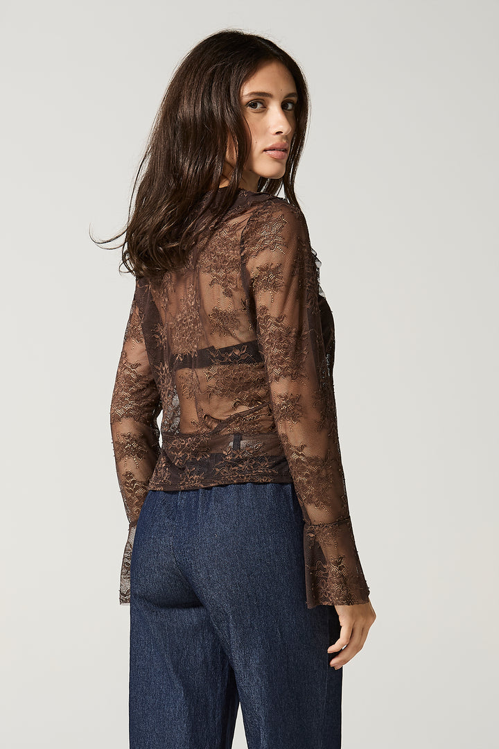 Maglia aperta in pizzo con volant sullo scollo