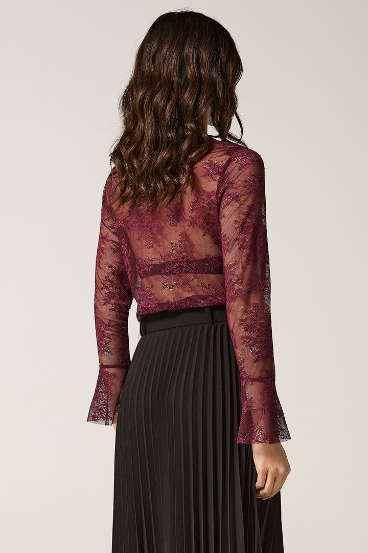 Maglia in pizzo con polso a campana