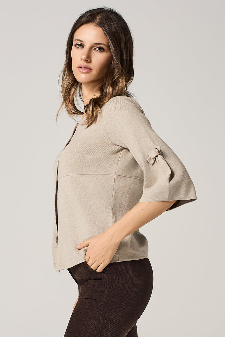 Cardigan con manica a campana e fiocco