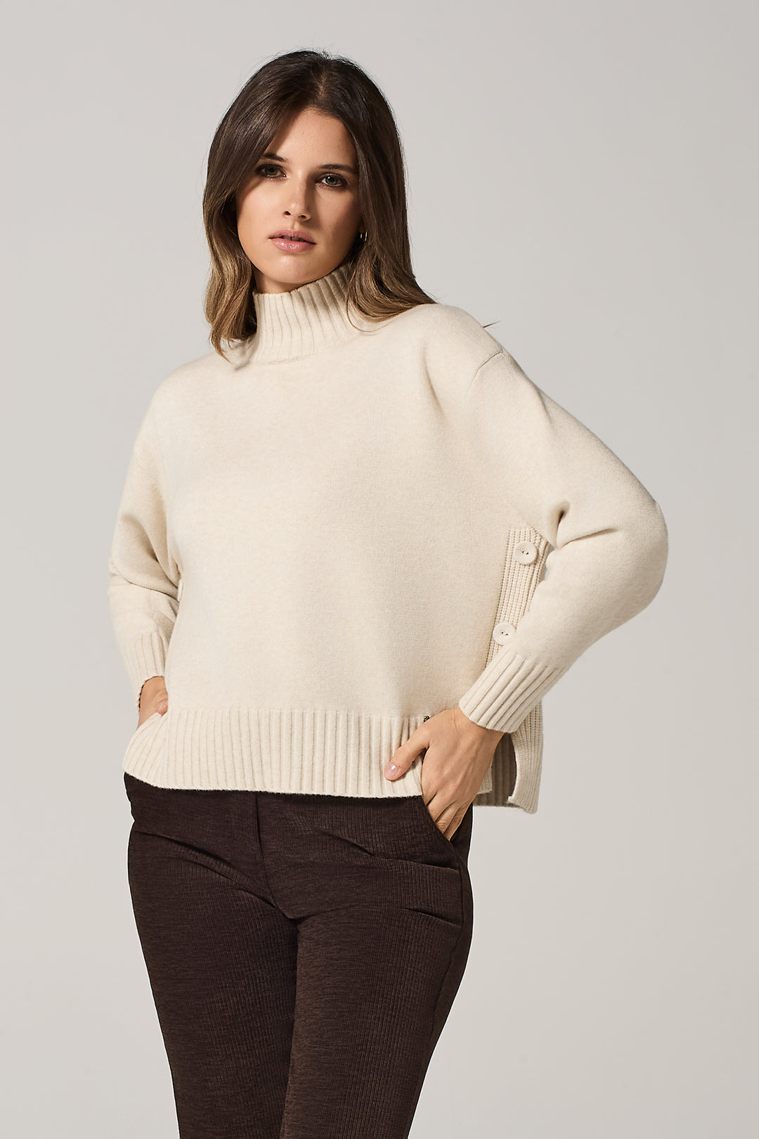 Maglia con bottoni laterali