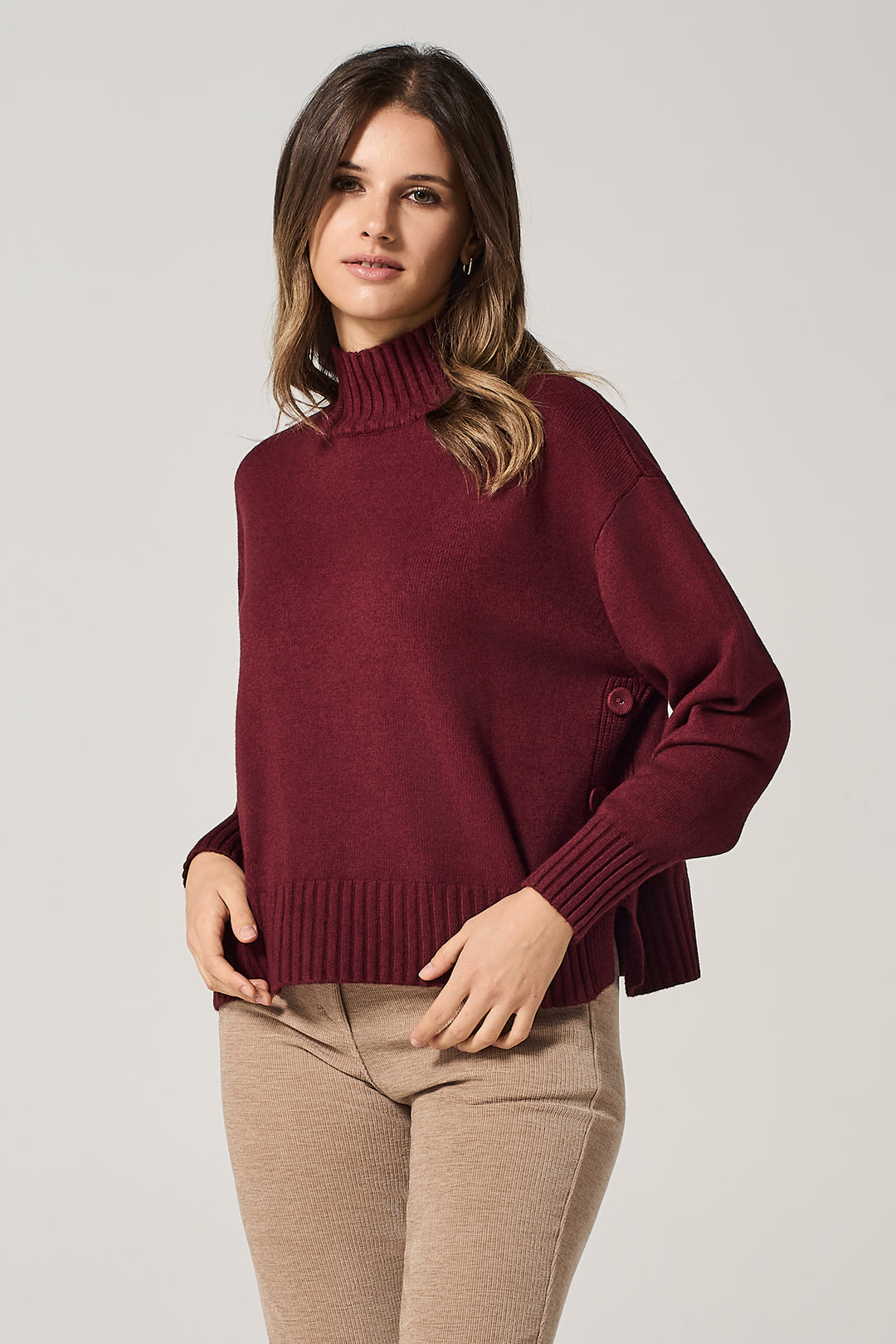 Maglia con bottoni laterali