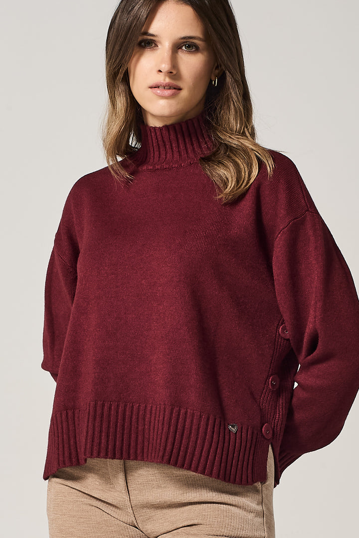 Maglia con bottoni laterali