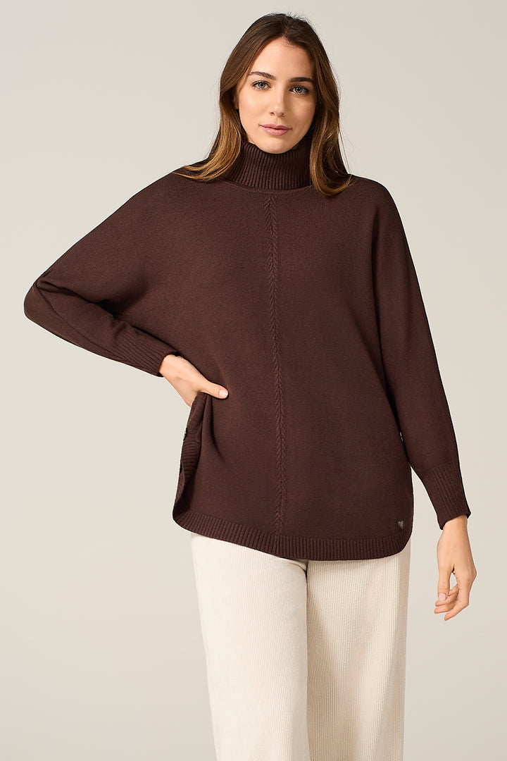 Maglia dolcevita over con bottoni laterali