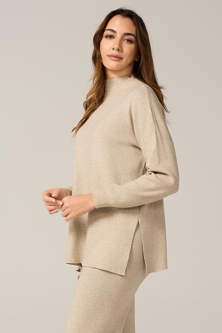 Maglia lupetto con spacchetti laterali