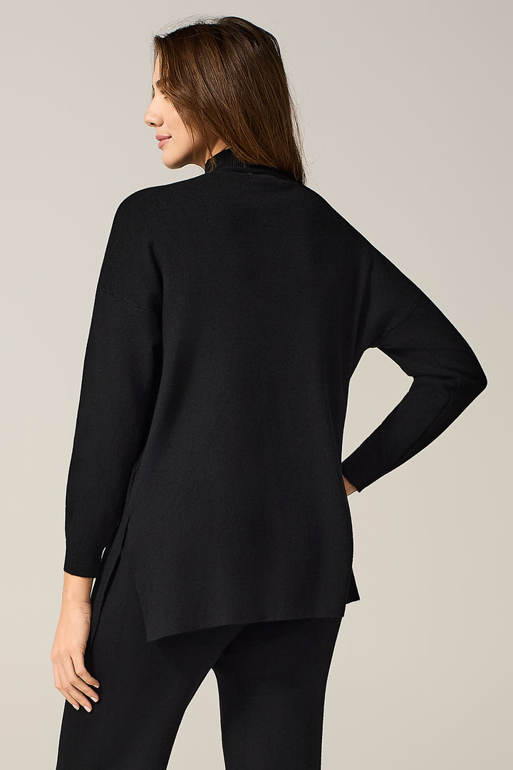 Maglia lupetto con spacchetti laterali