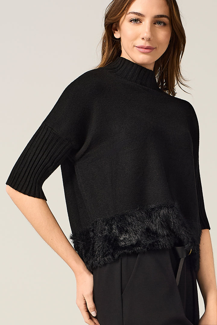 Maglia dolcevita con bordo effetto pelliccia