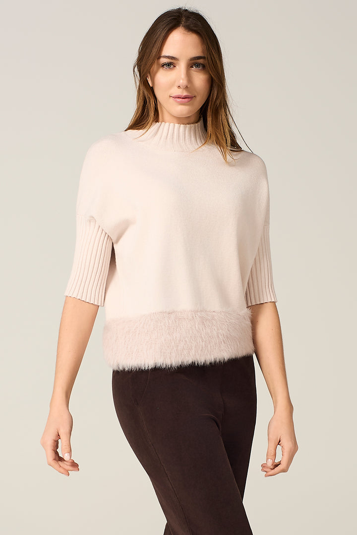 Maglia dolcevita con bordo effetto pelliccia