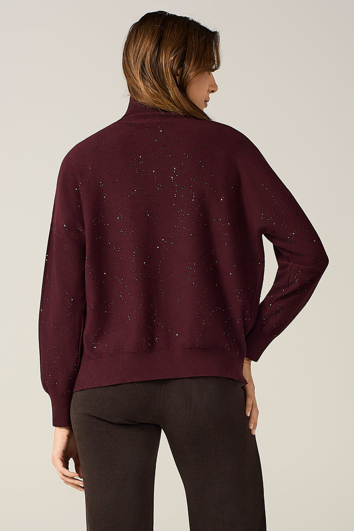 Maglia dolcevita con micro paillettes