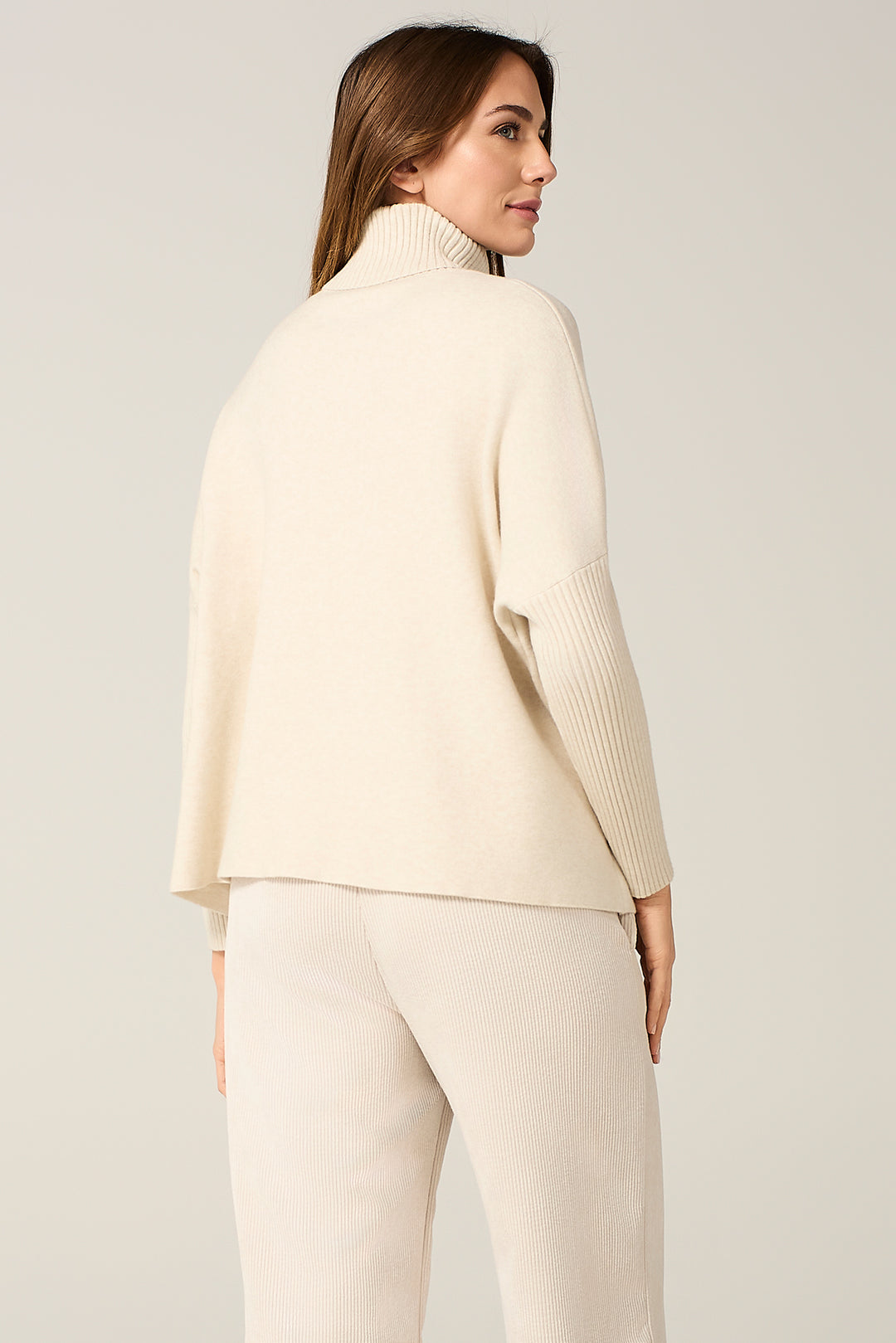 Maglia collo a lupetto fondo ampio