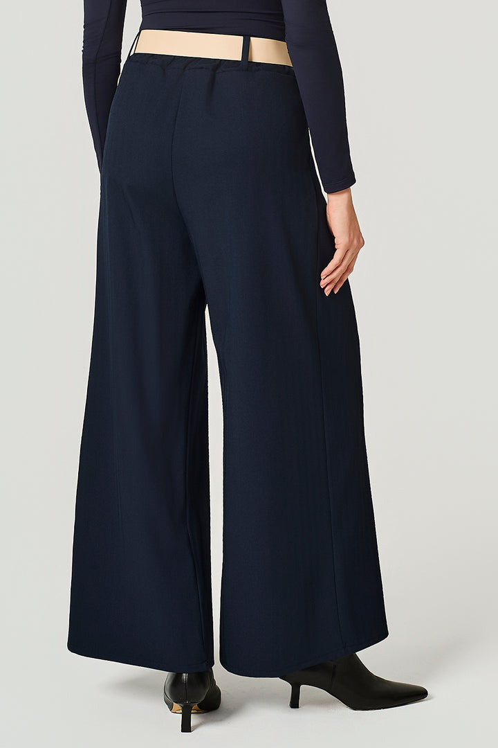 Pantalone over con pinces e cinta