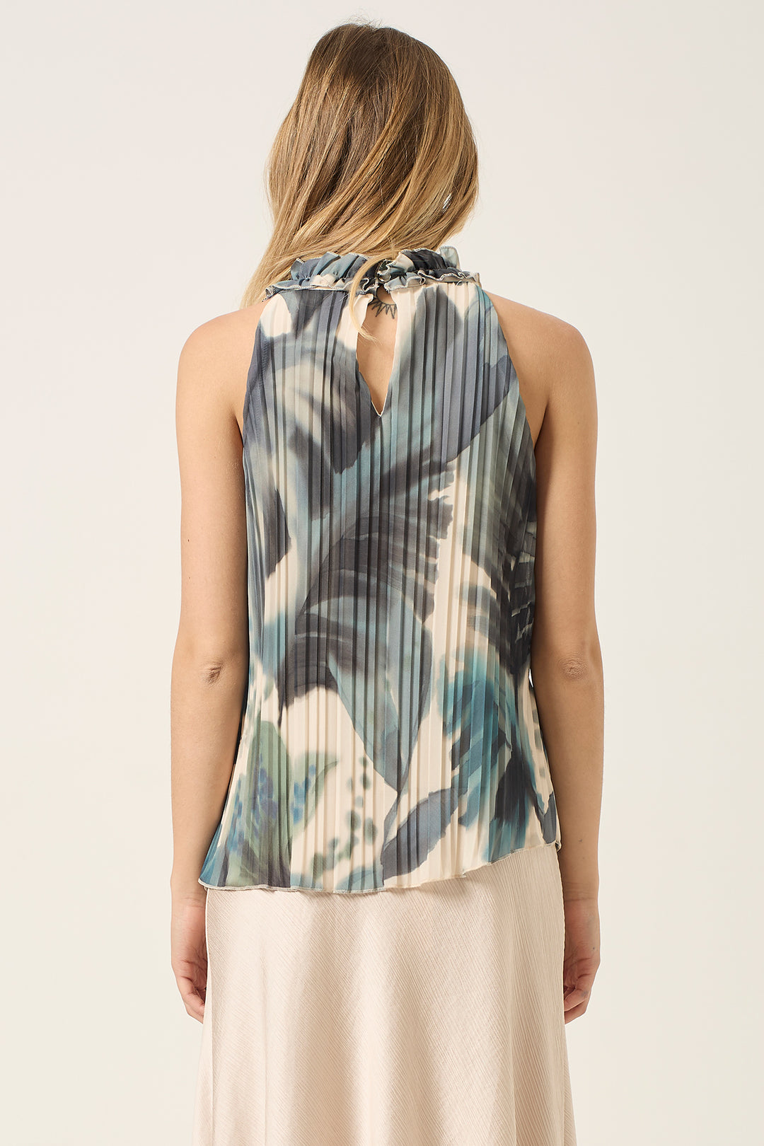Top in georgette plissè fantasia foglie