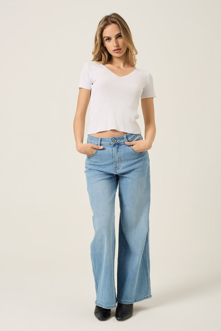 Jeans con tasche rosa con microborchie