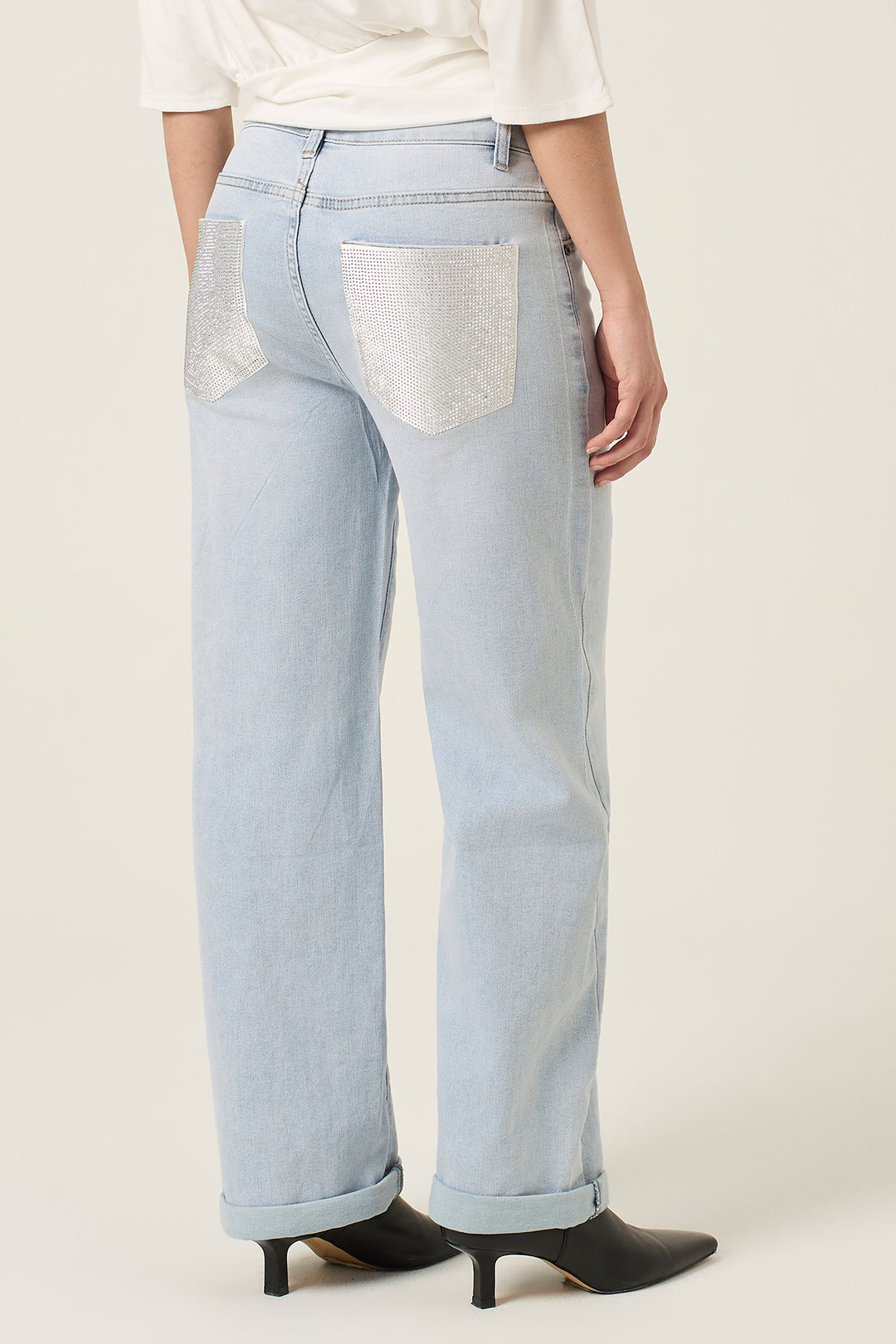 Jeans con tasche argento con microborchie