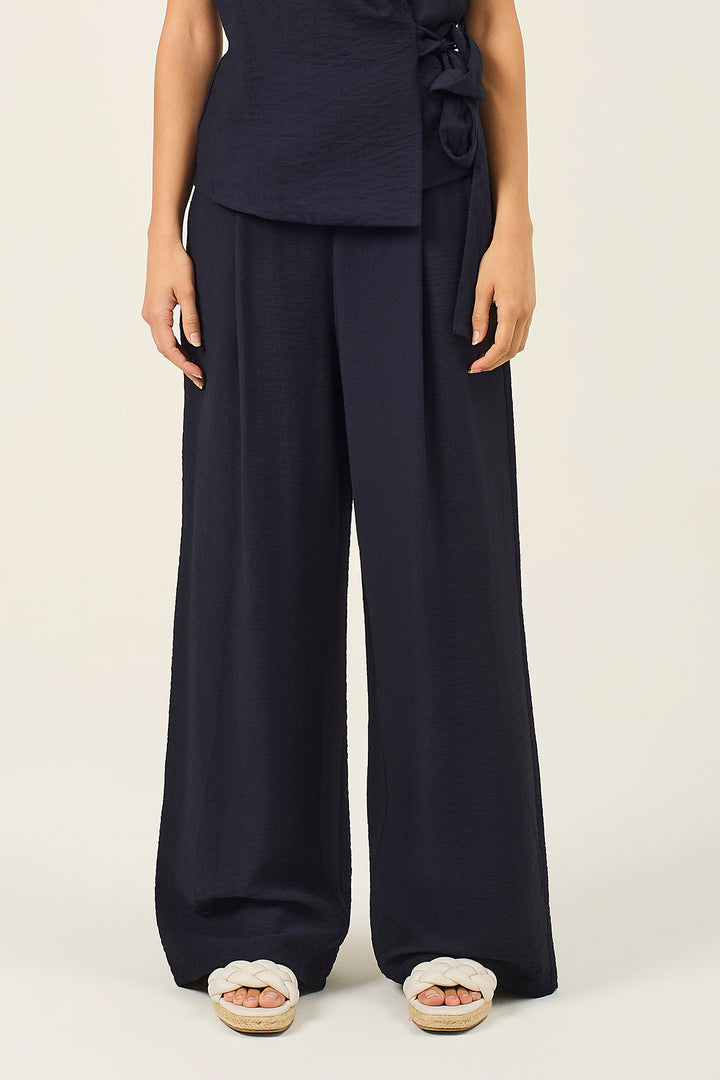 Pantalone palazzo con pinces