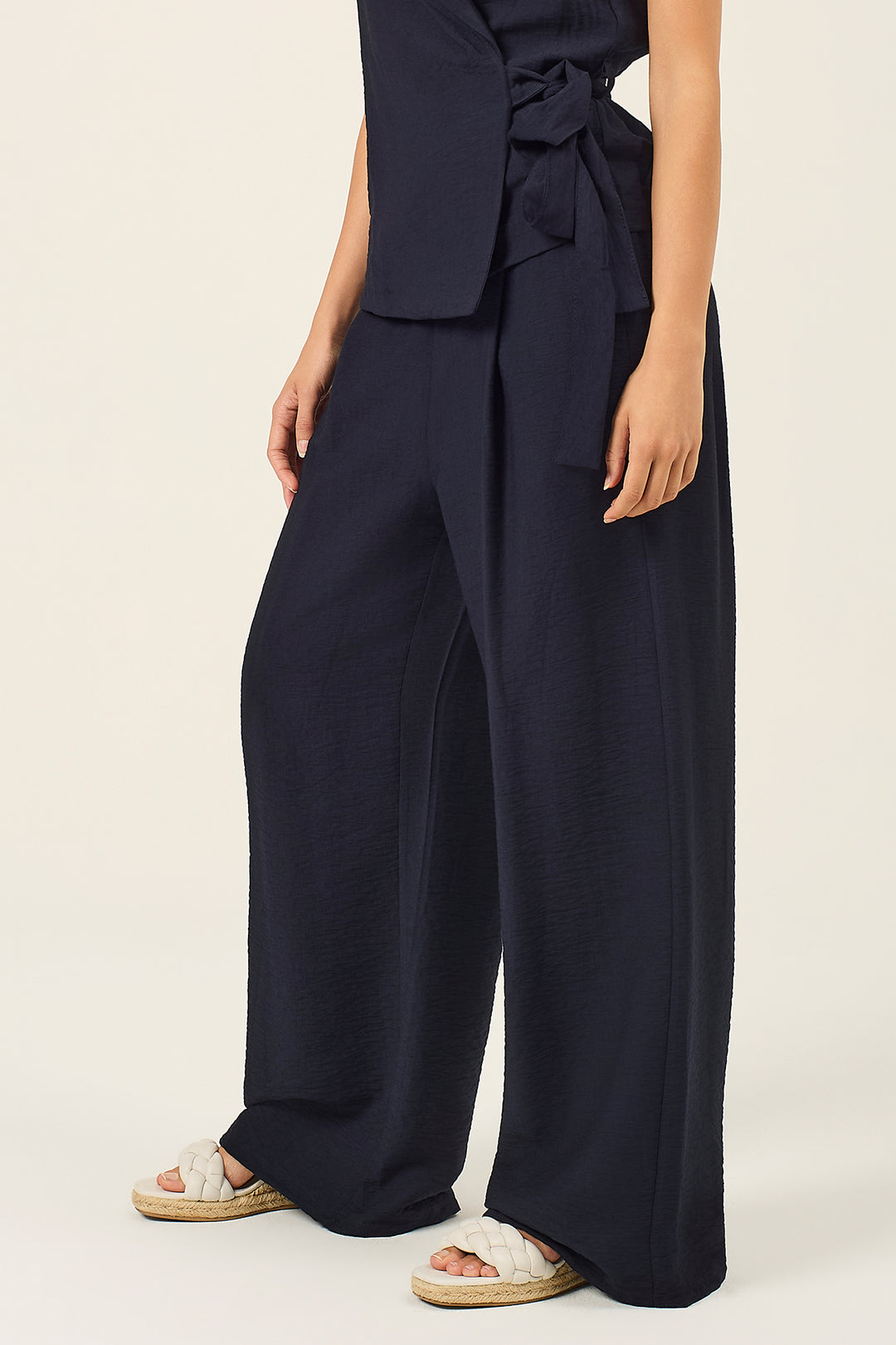 Pantalone palazzo con pinces