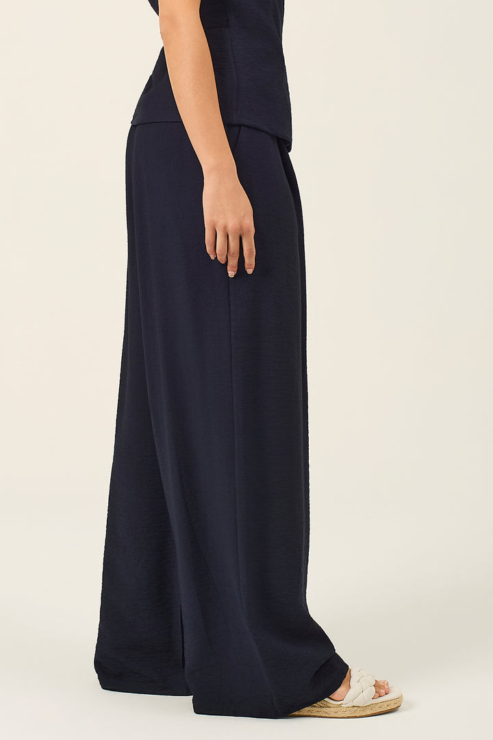 Pantalone palazzo con pinces