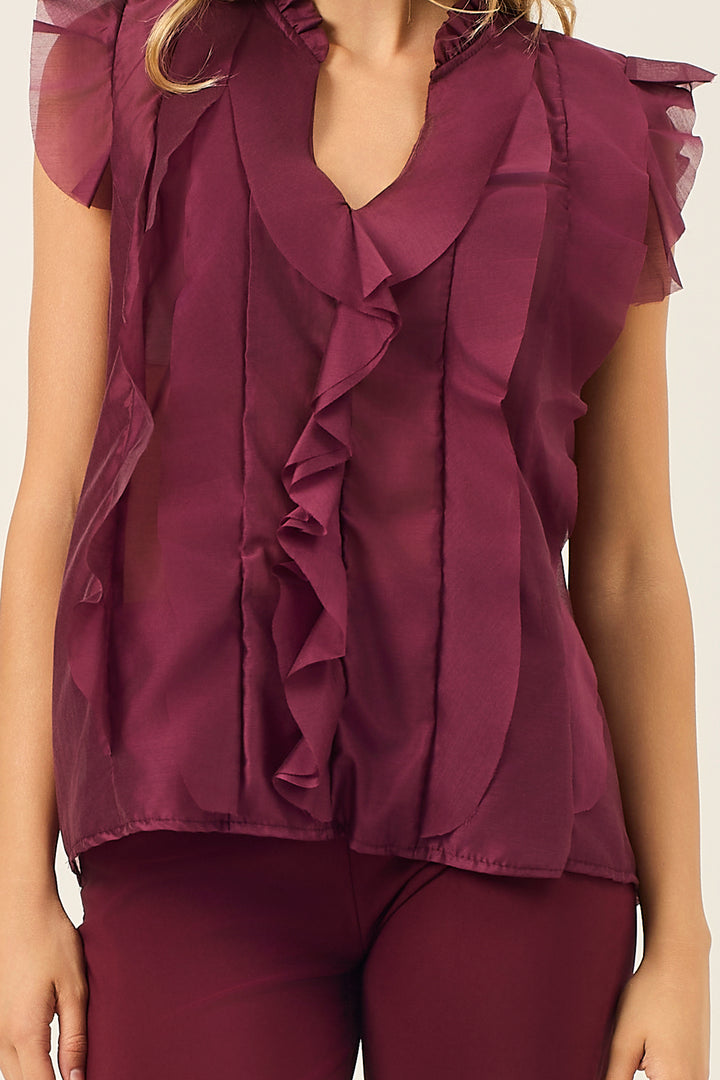 Camicia smanicata con volant
