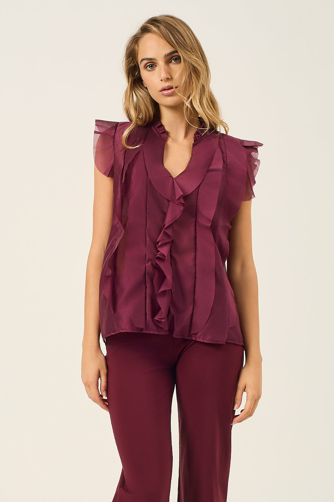 Camicia smanicata con volant
