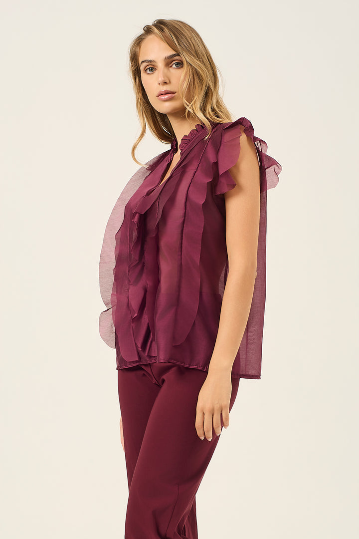 Camicia smanicata con volant