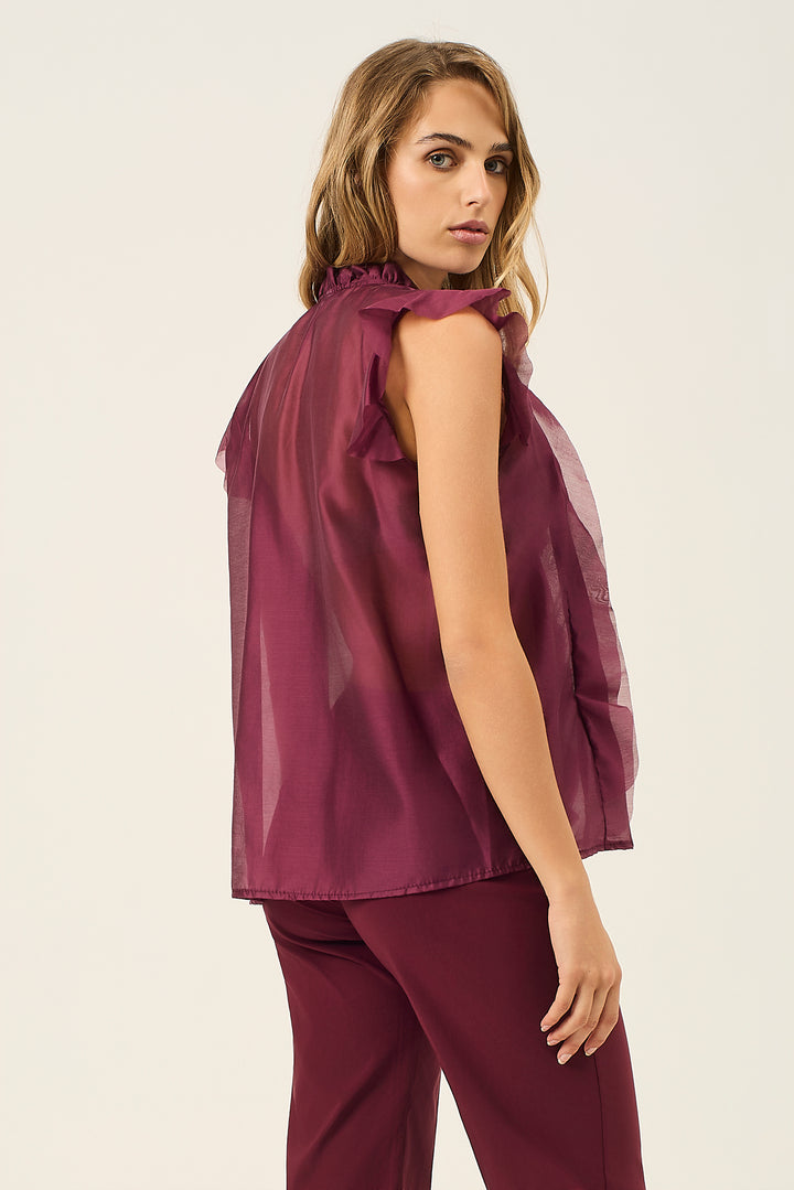 Camicia smanicata con volant