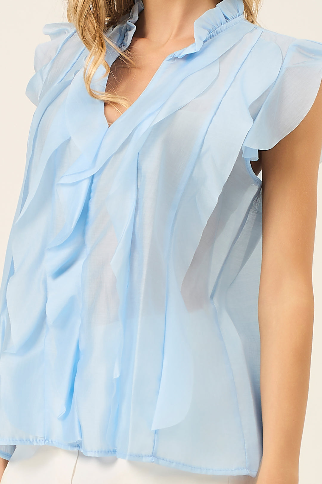 Camicia smanicata con volant