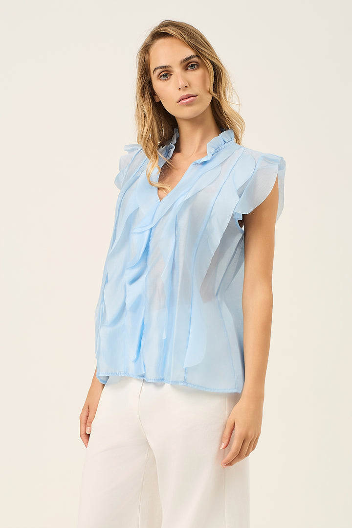 Camicia smanicata con volant