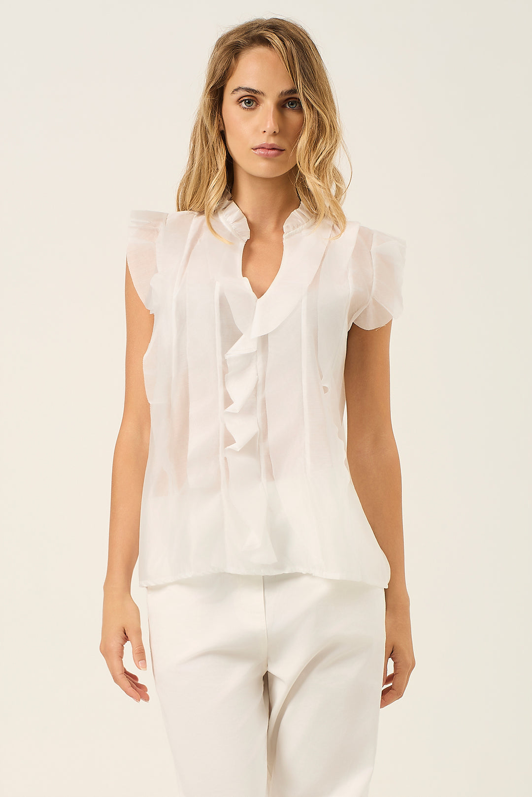 Camicia smanicata con volant