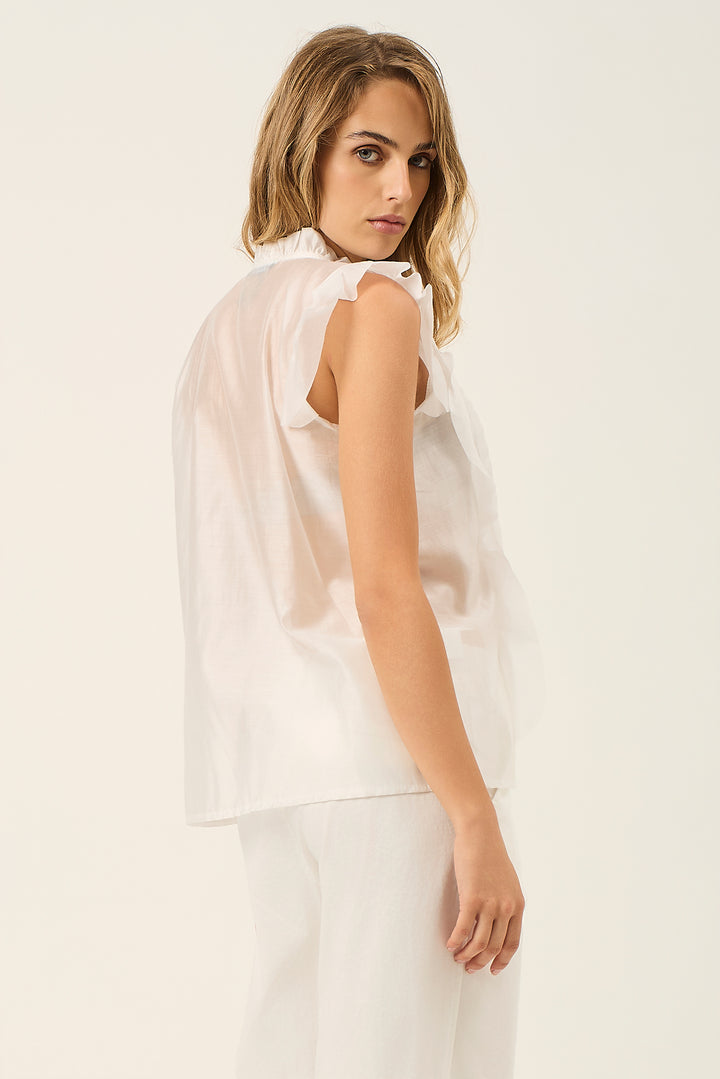 Camicia smanicata con volant