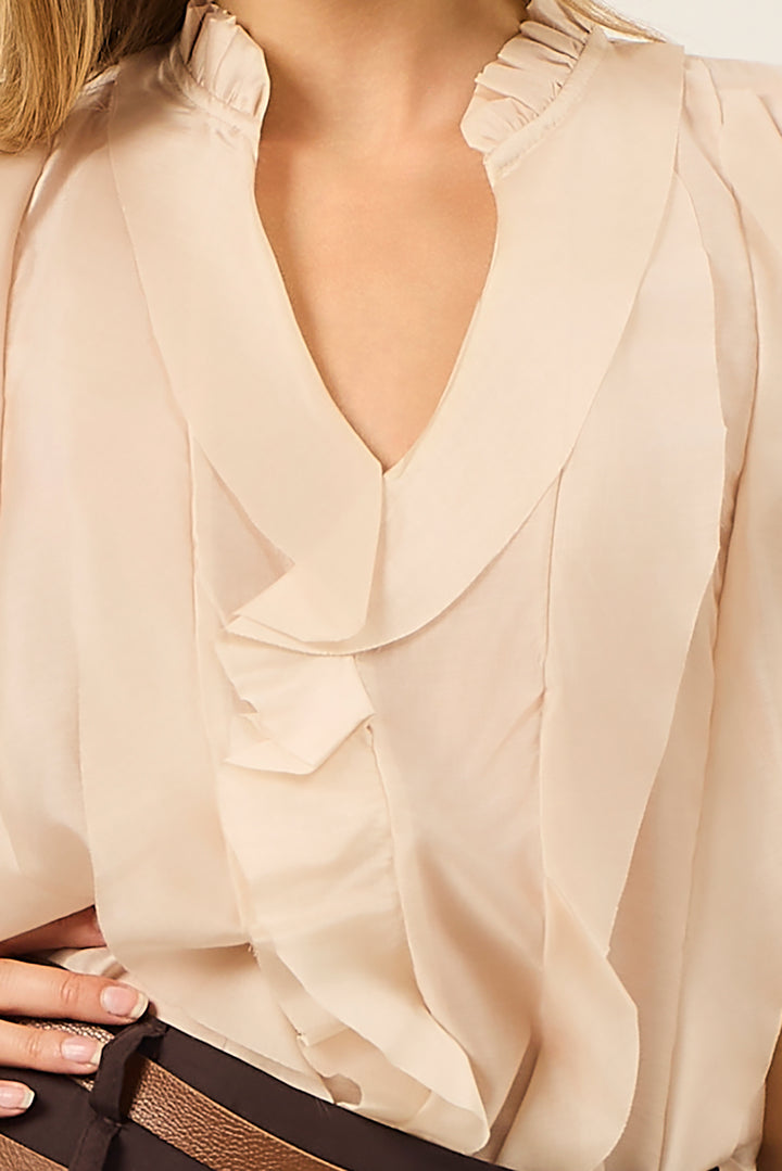 Camicia smanicata con volant