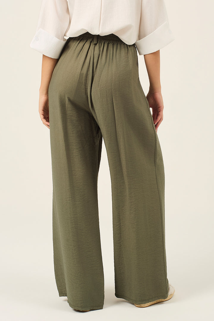 Pantalone palazzo con pinces
