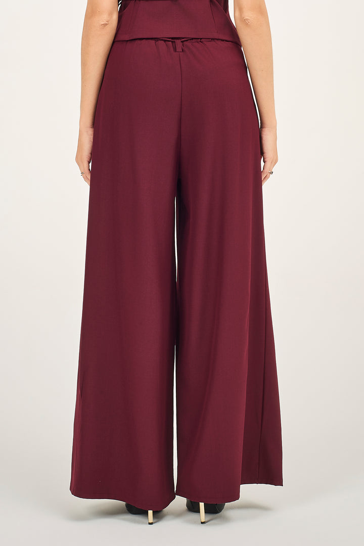 Pantalone a palazzo con pieghe e pinces