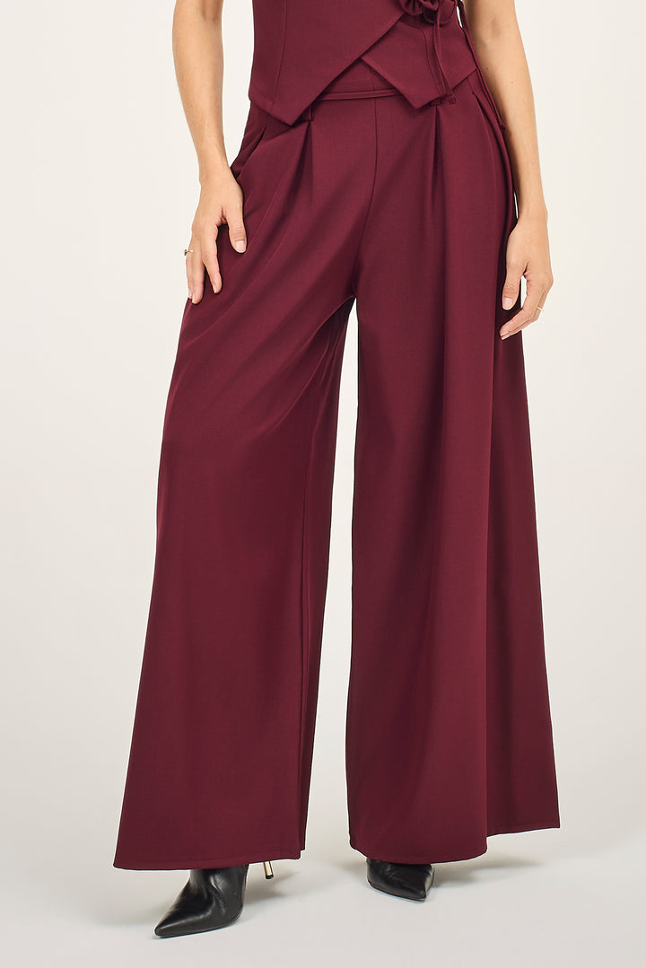 Pantalone a palazzo con pieghe e pinces