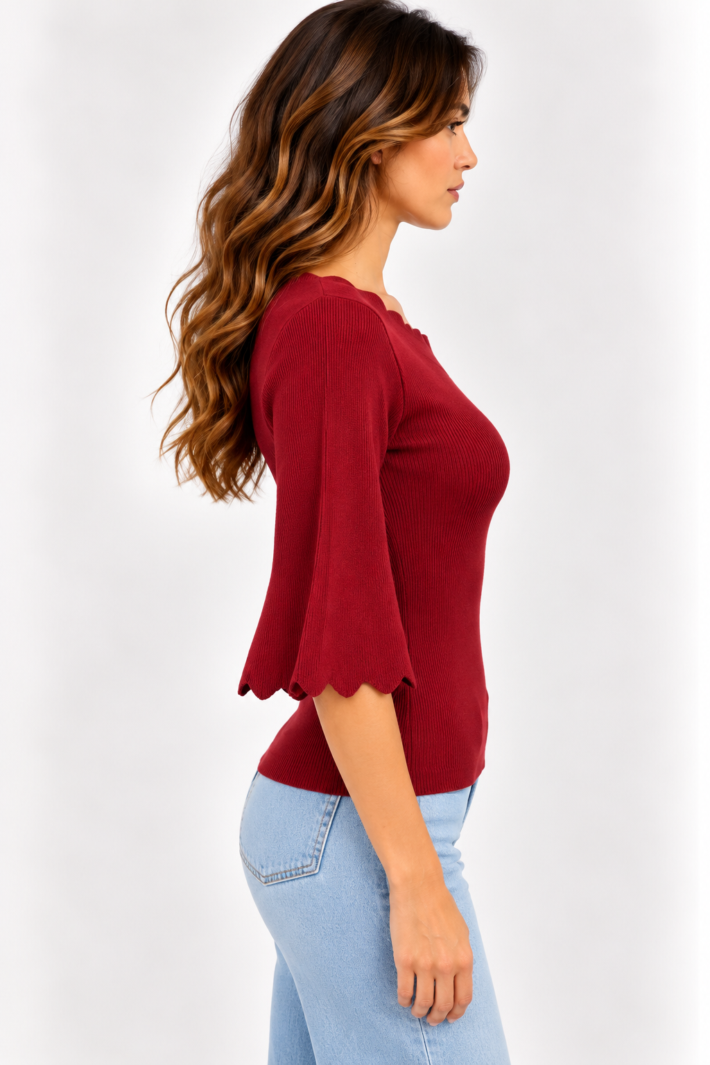 Maglia con bordi a ondine
